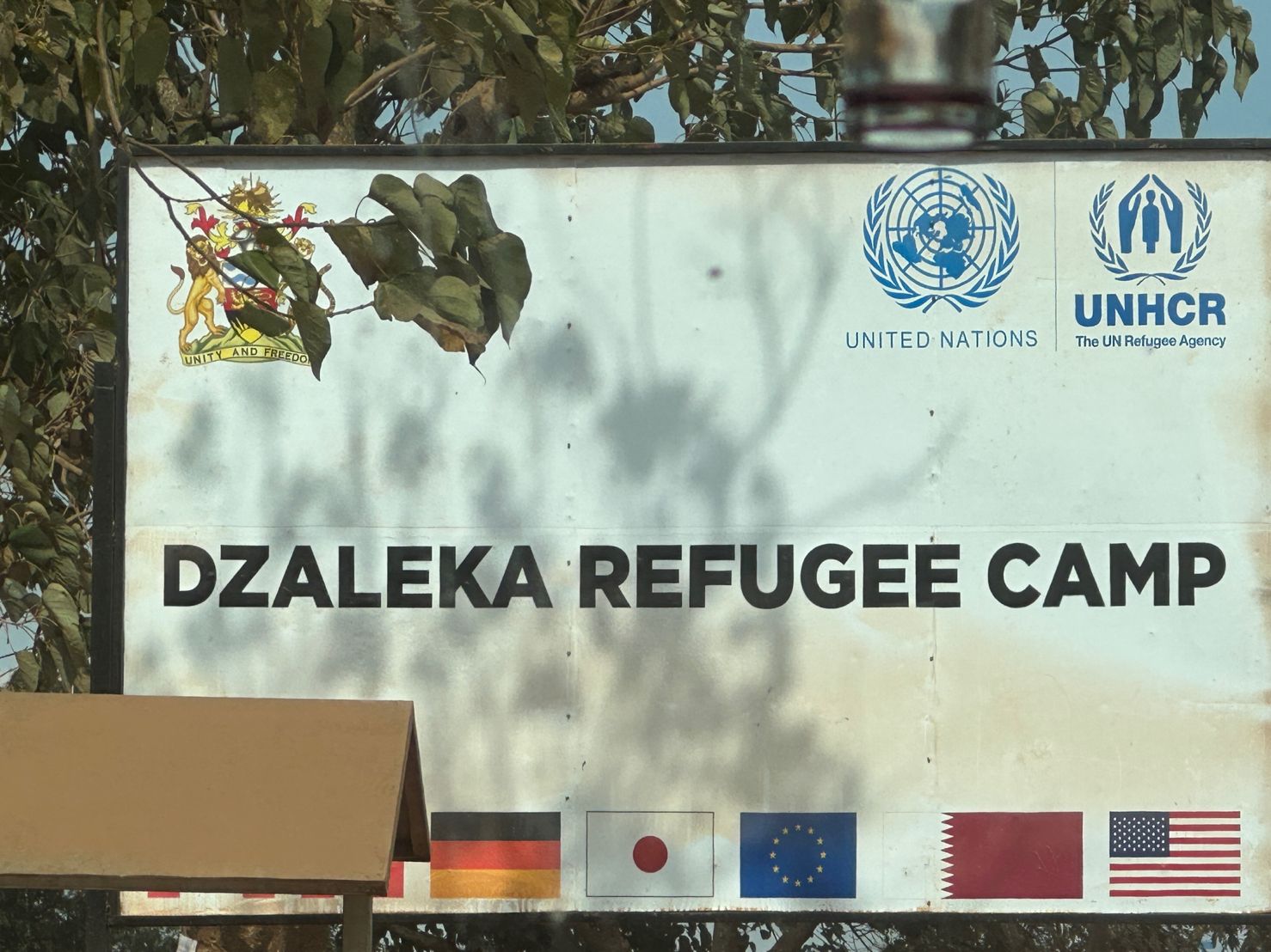 Sign with words "Dzaleka Refugee Camp"